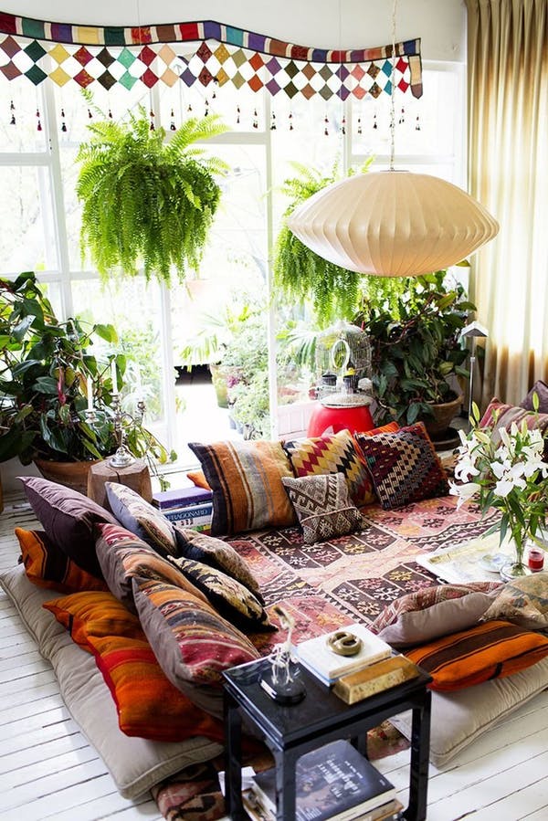 boho living room who needs couches.jpeg